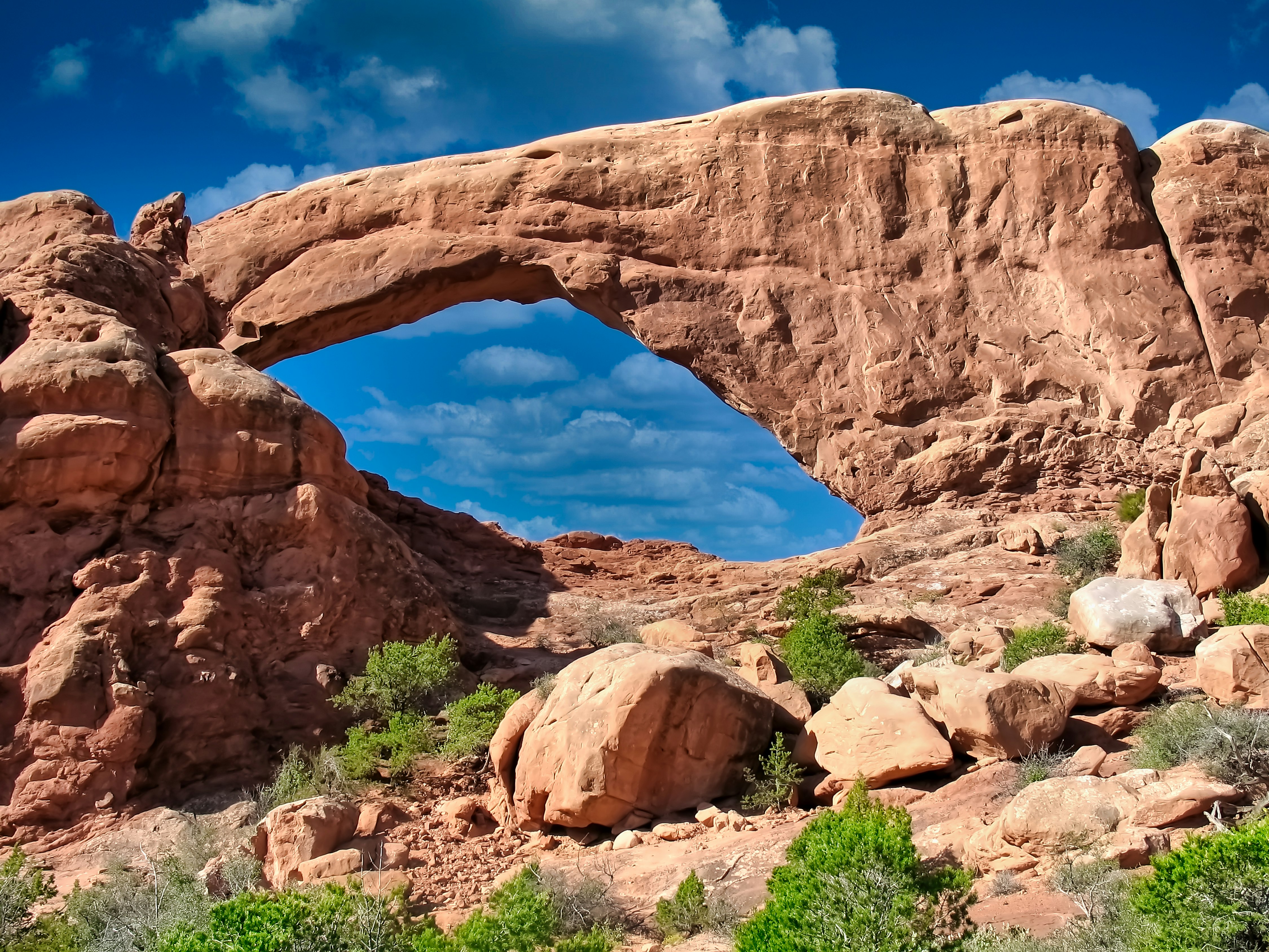 brown rock formation under blue sky during daytime